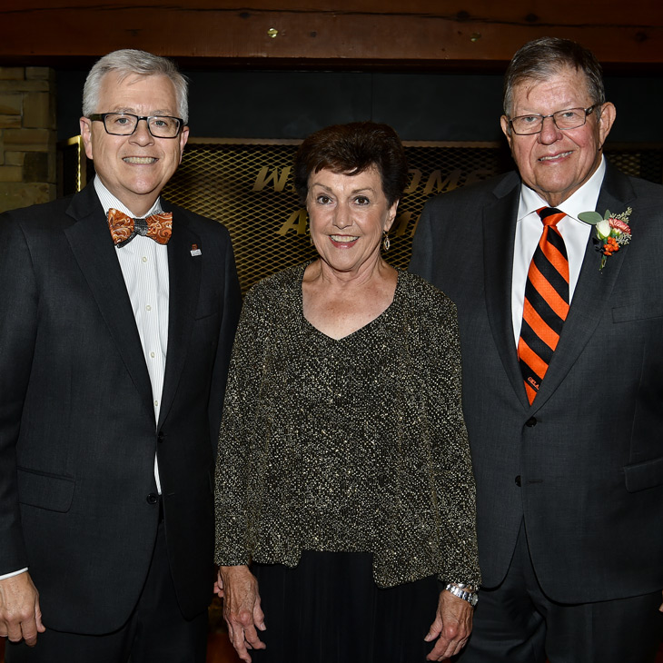 Mike and Judy Johnson with Dean Eastman