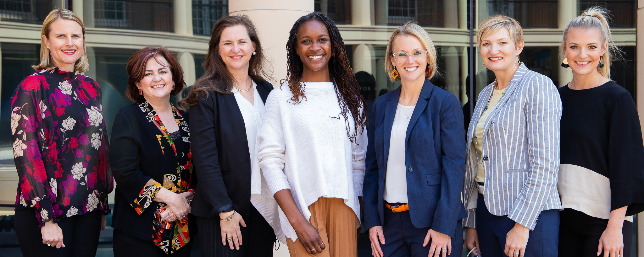 Women dressed in business attire. 