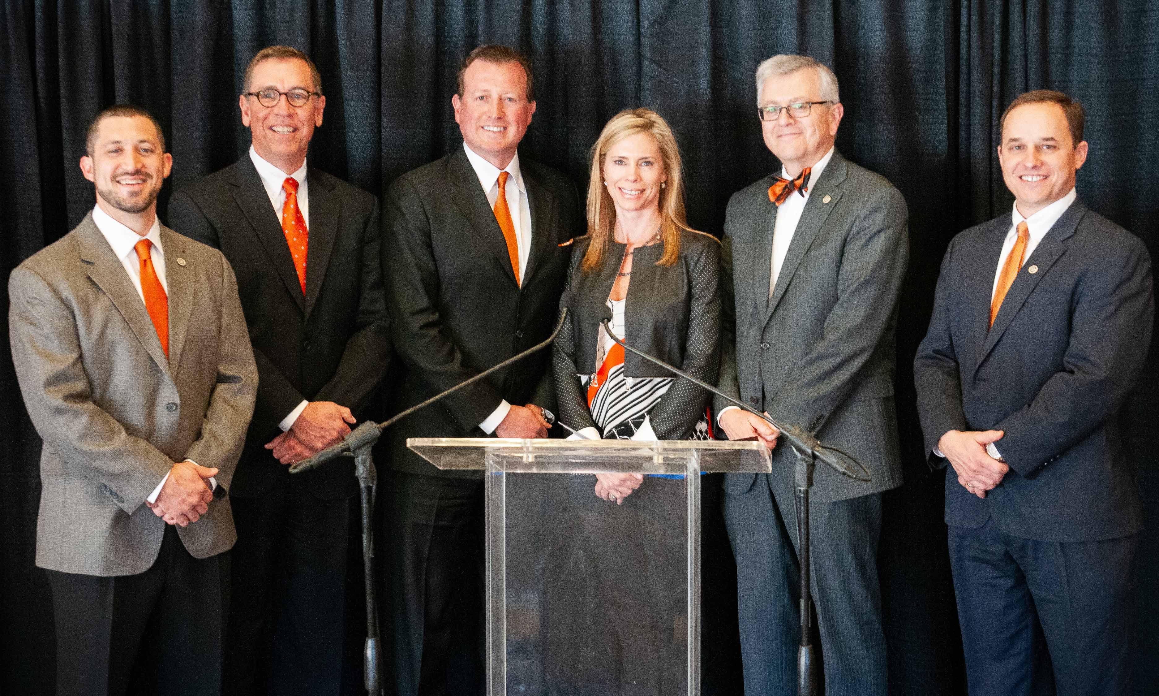 Joe and Monica Eastin with business school faculty and dean of 2014 at the Eastin Center announcement.