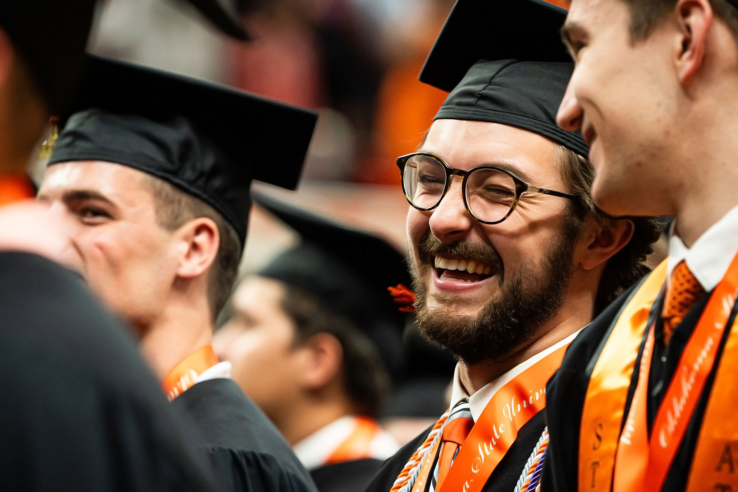 Student smiling at graduation