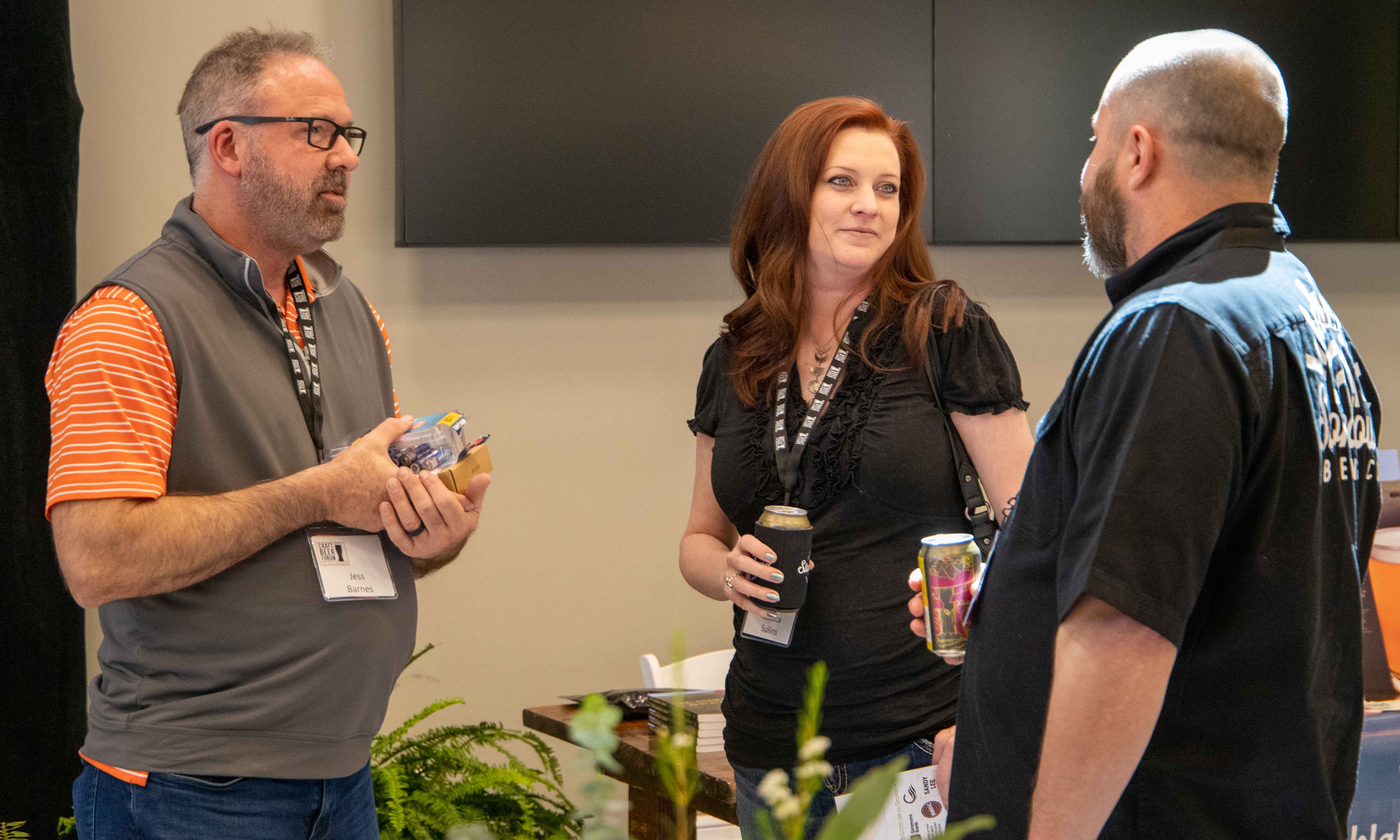 Three people talking.