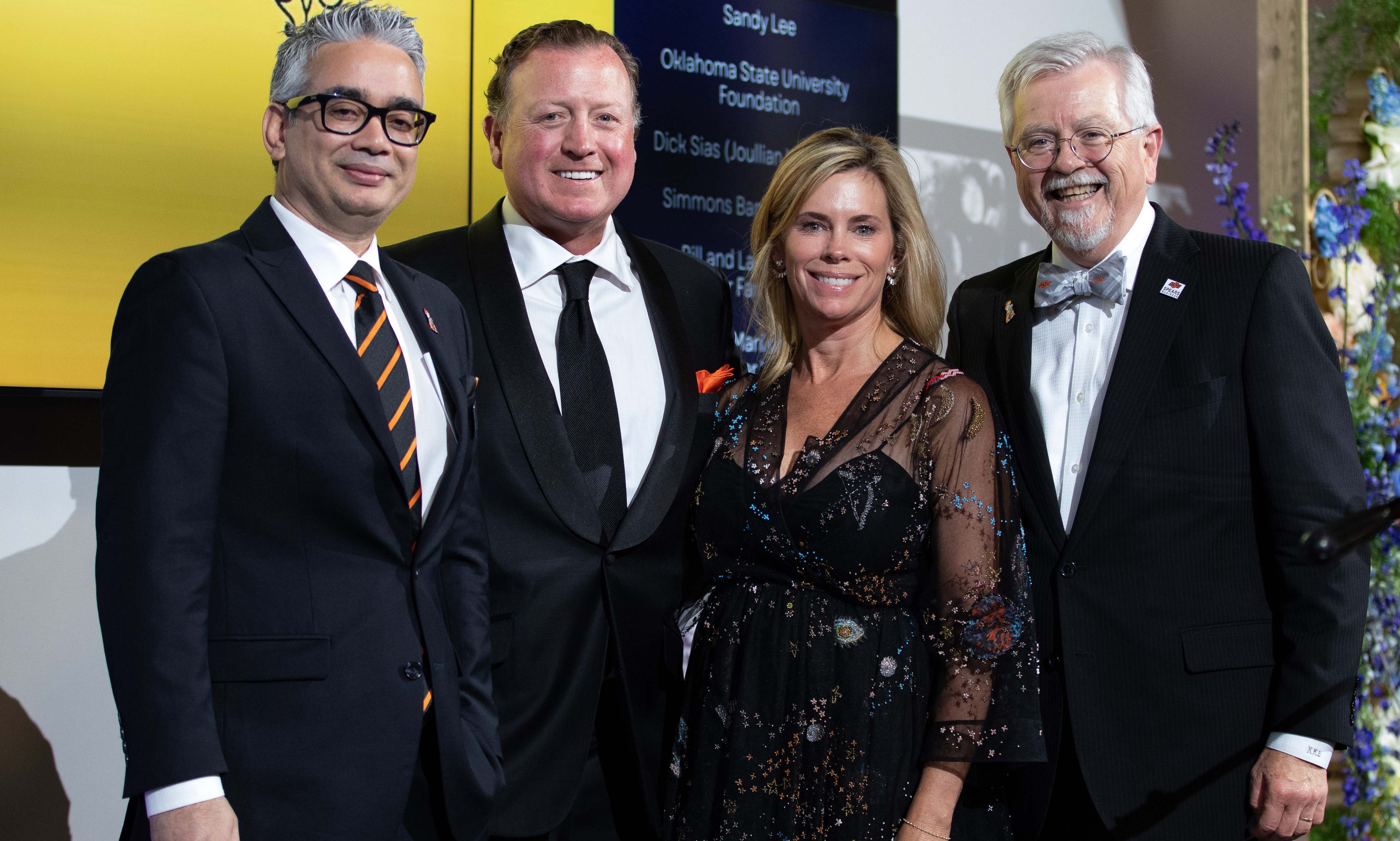 Dean Eastman smiling with the Eastins.