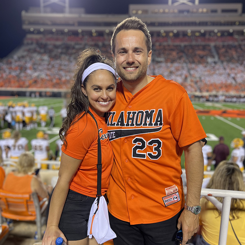 Jeremy Greenfield and his fiance, Zoe, attend an OSU football game in 2022.