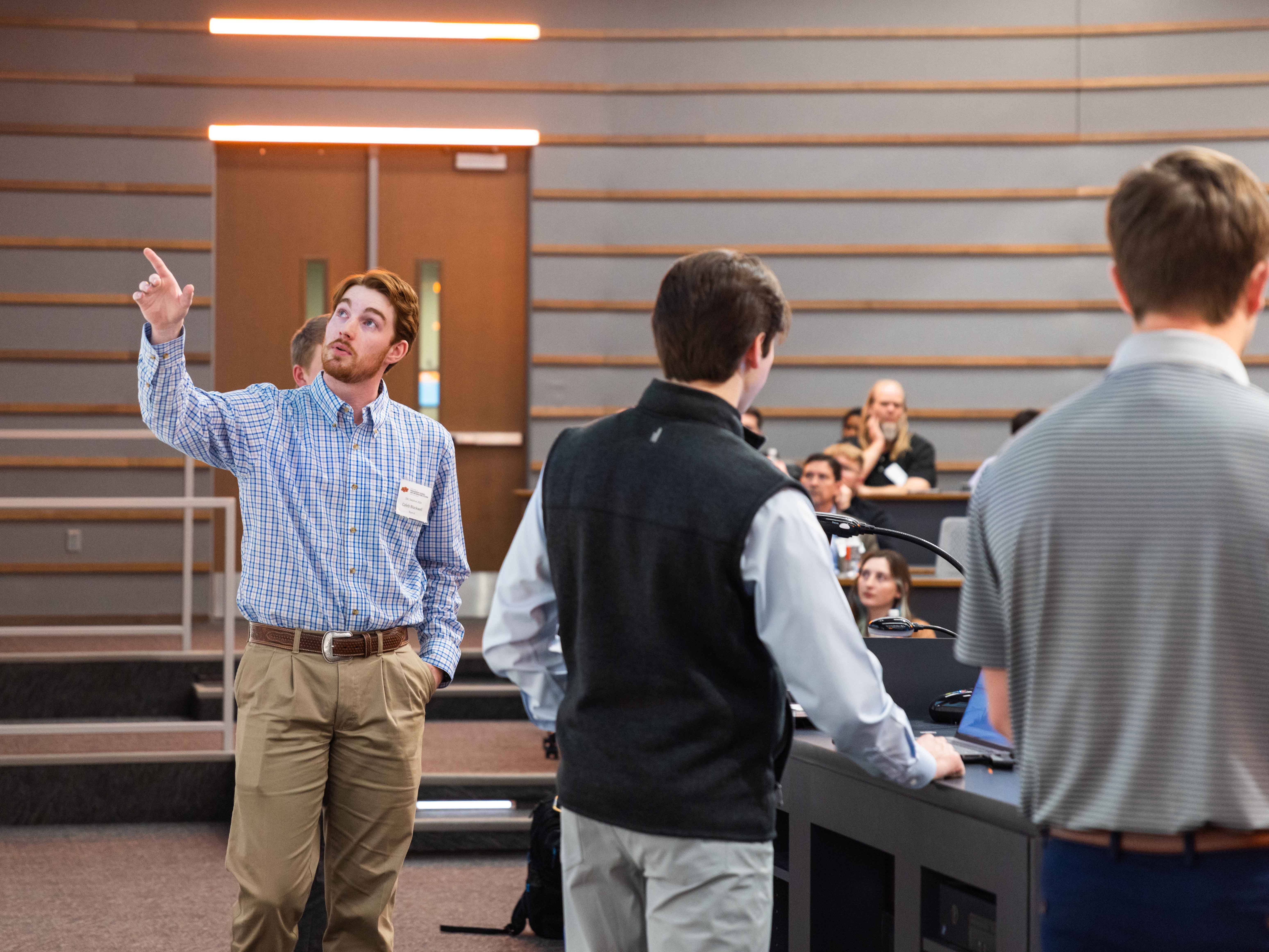 Student giving a presentation in a classroom