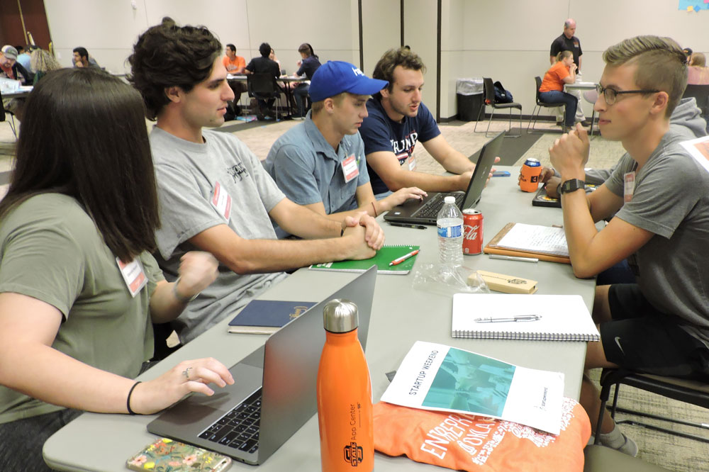 Students working on their startup projects