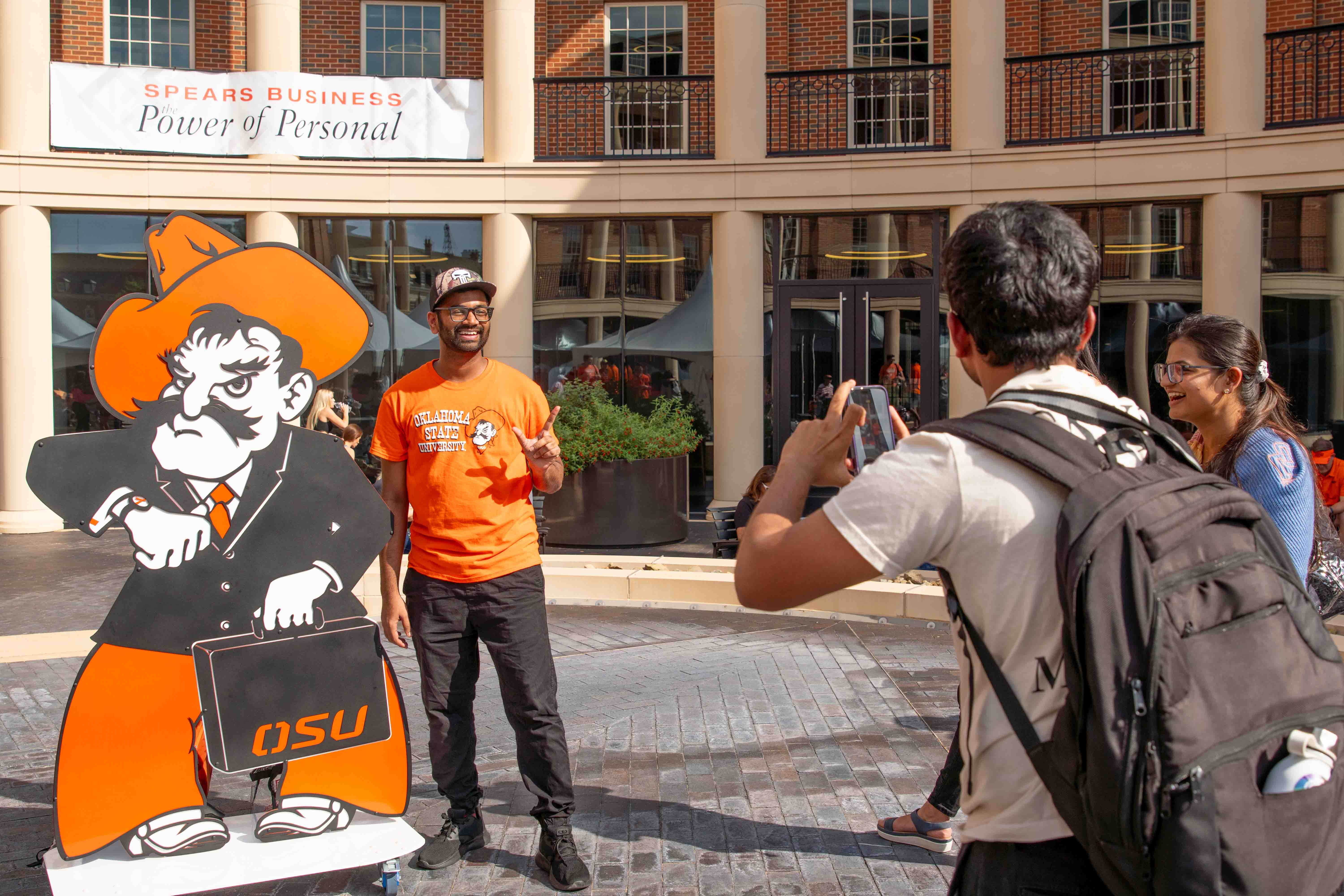 Students taking a picture with Business Pete