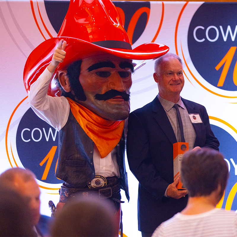 Pistol Pete poses with a Cowboy100 winner