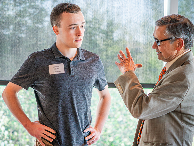 Dr. Sharda and student Dr. Sharda and a student